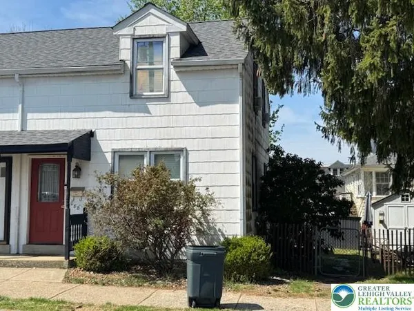 a view of a house with street