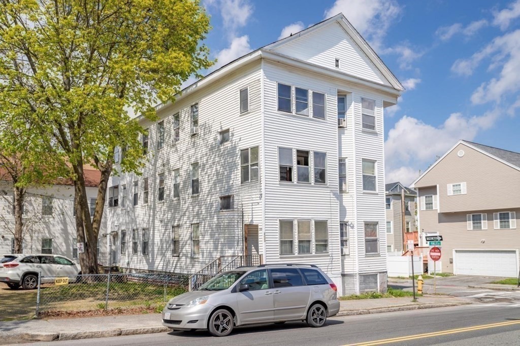 a car parked in front of a building