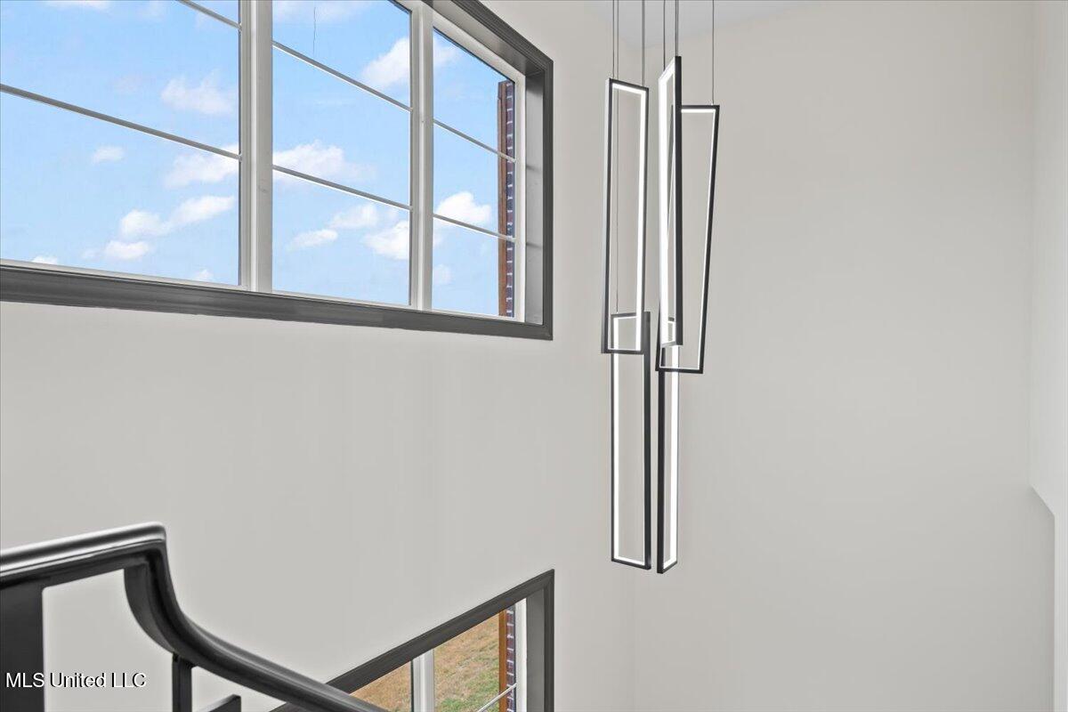 1474 Tributary Drive Hernando, MS 38632 - Photo 33 of 48 Beautiful Chandlier in stairway