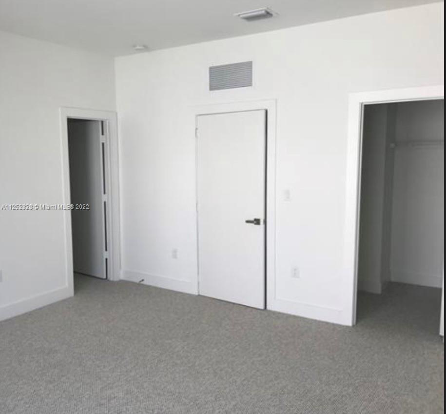 7261 Northwest 103rd Path Doral, FL 33178 - Photo 8 of 10 a view of an empty room