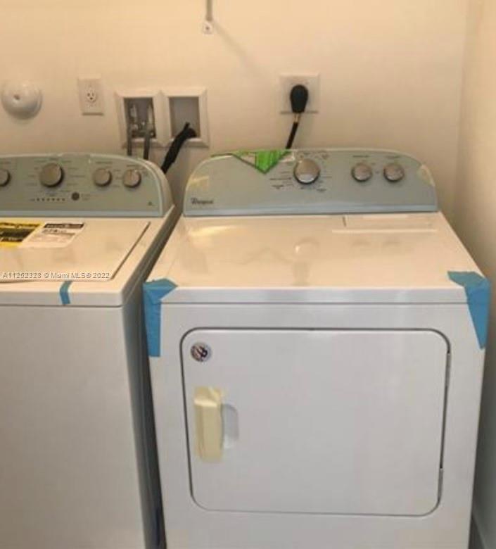 7261 Northwest 103rd Path Doral, FL 33178 - Photo 10 of 10 a utility room with dryer and washer