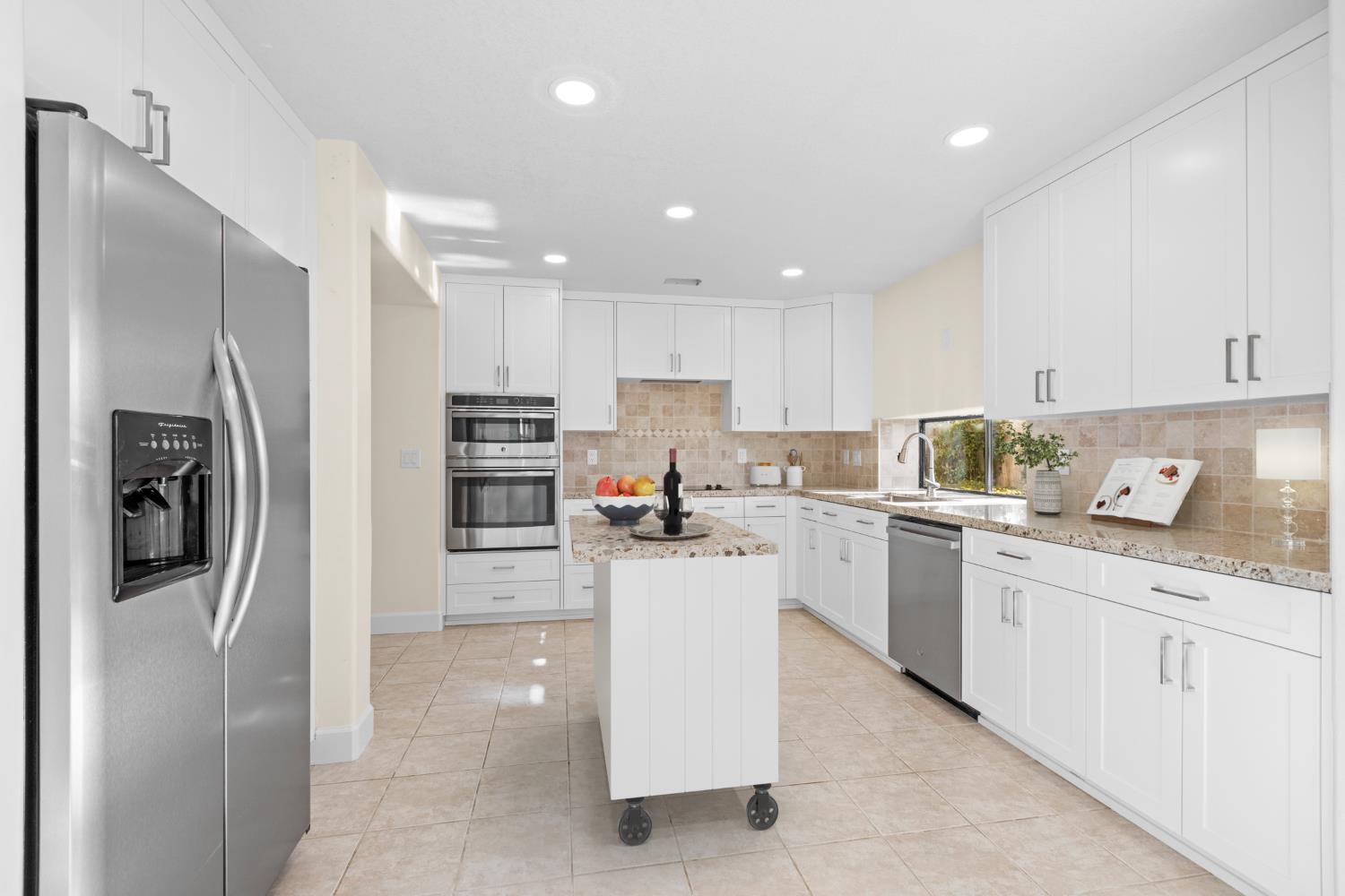 140 Hillside Place Jackson, CA 95642 - Photo 11 of 39 a kitchen with a sink stainless steel appliances and cabinets