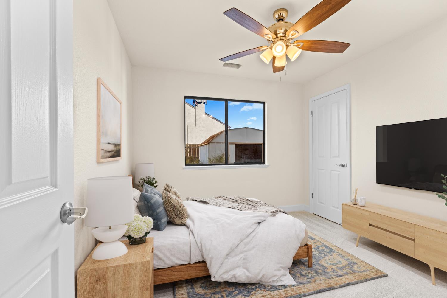 140 Hillside Place Jackson, CA 95642 - Photo 26 of 39 a bedroom with a bed and a flat screen tv