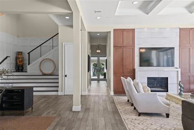 a kitchen with a stove a refrigerator and a sink