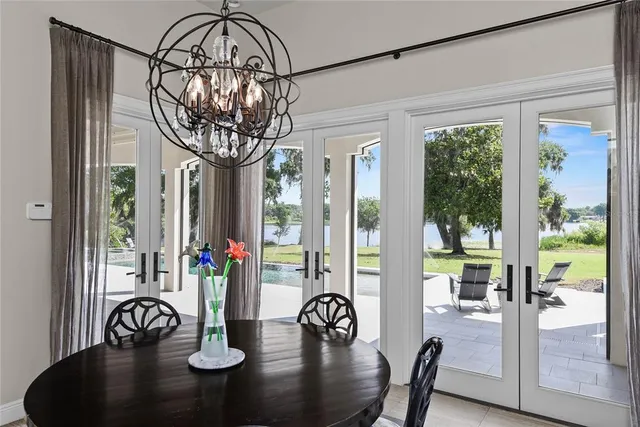 a spacious bedroom with a bed and a window