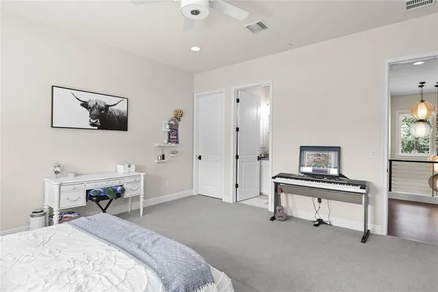 an aerial view of a house with a lake view