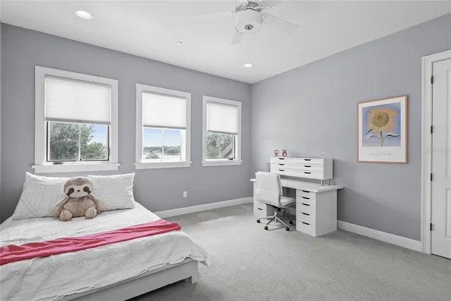 a front view of house with yard and outdoor seating