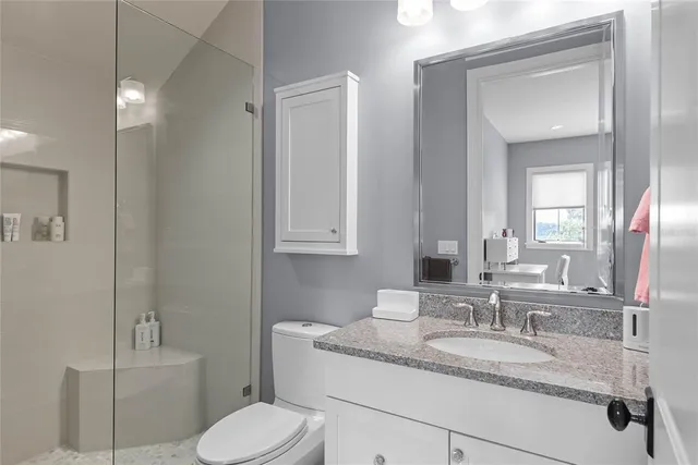 a view of a yard with large trees