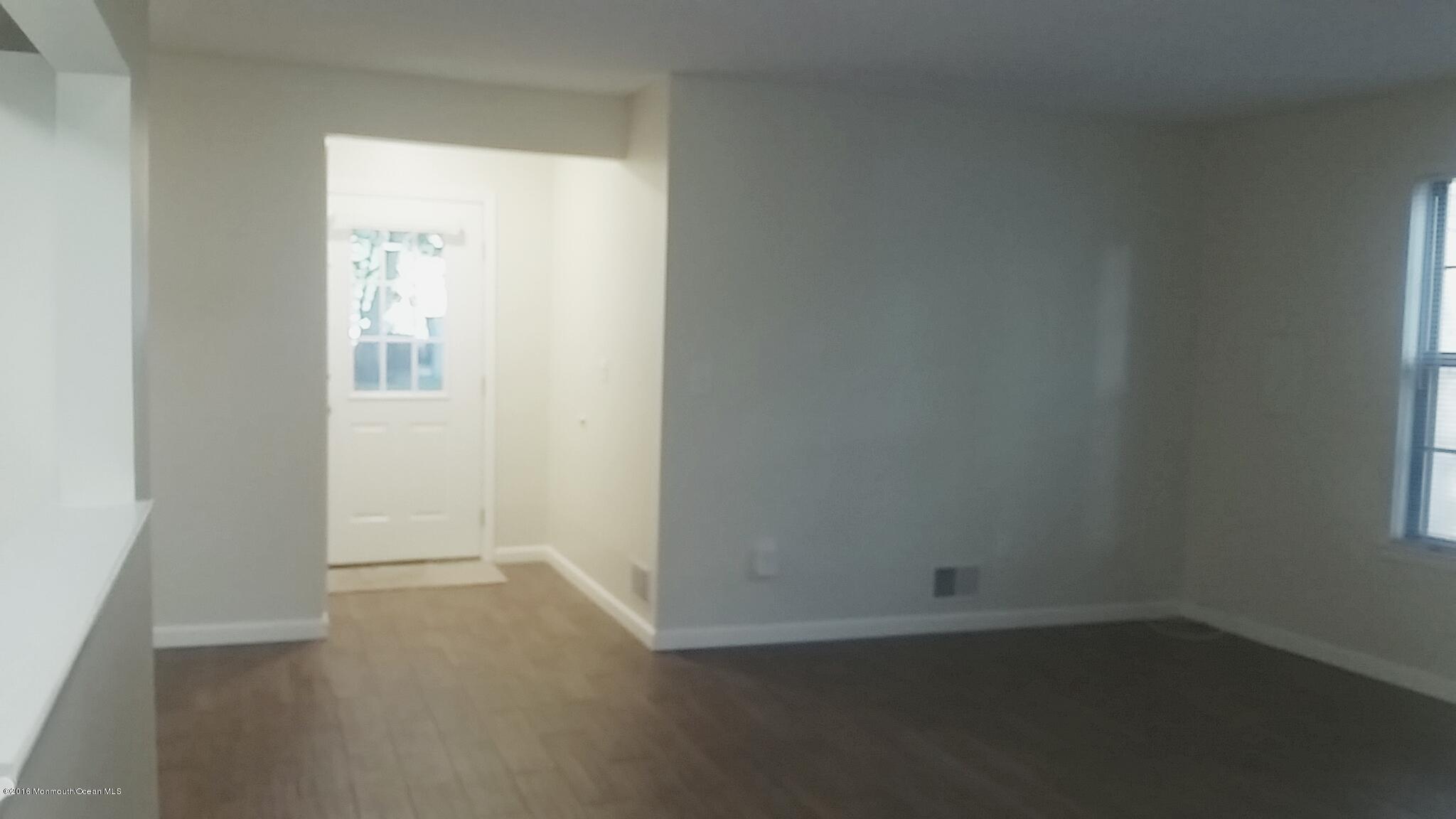 71 Azalea Circle Jackson, NJ 08527 - Photo 4 of 23 an empty room with a window