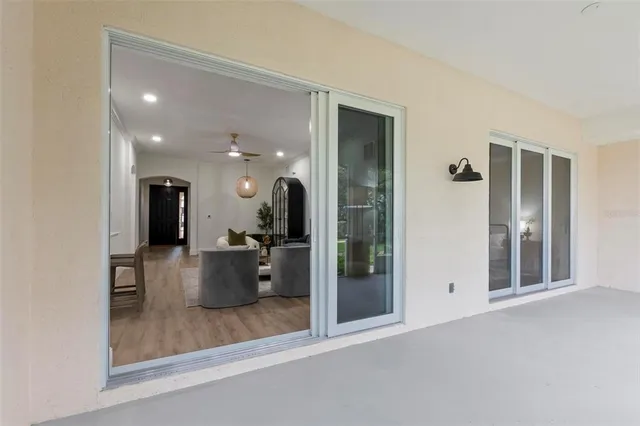 a view of a living room with a large window