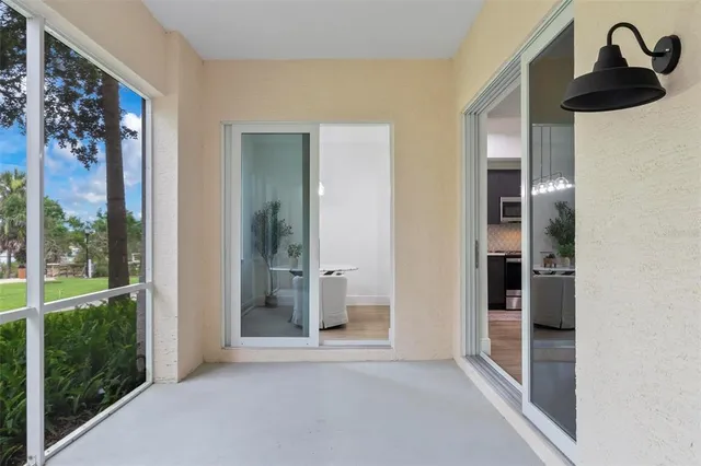 a view of a bathroom from a hallway