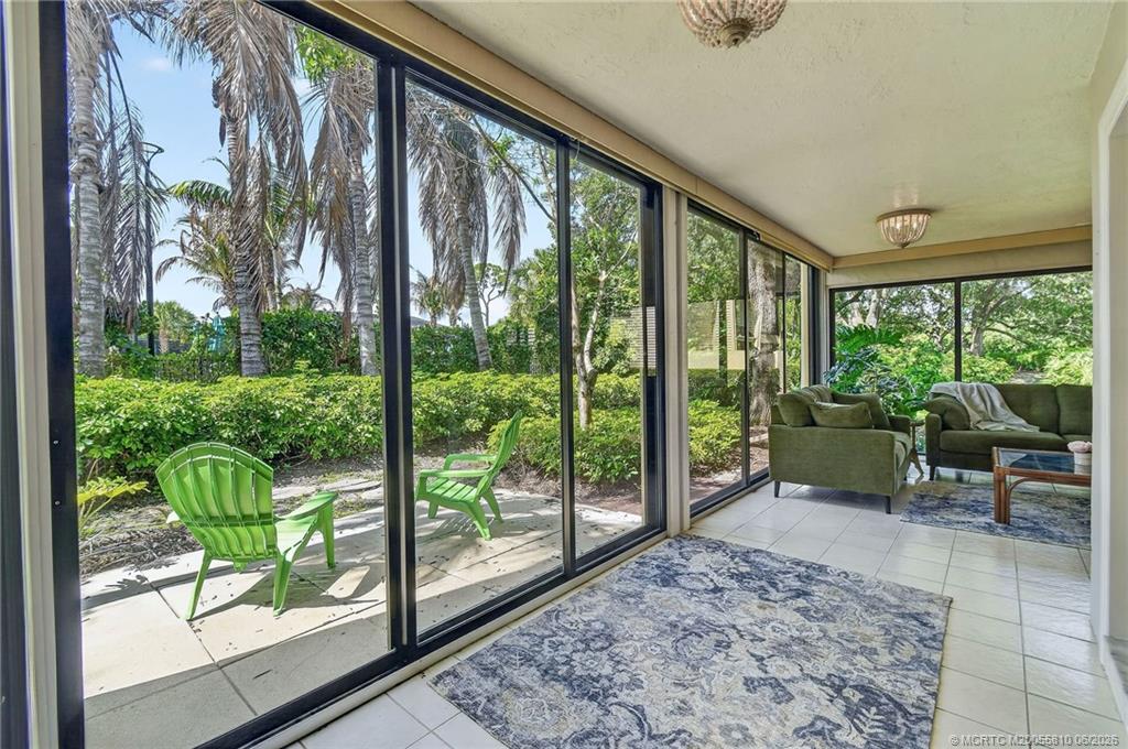 5152 Southeast Club Way, Unit 104 Stuart, FL 34997 - Photo 37 of 43 Sun Room