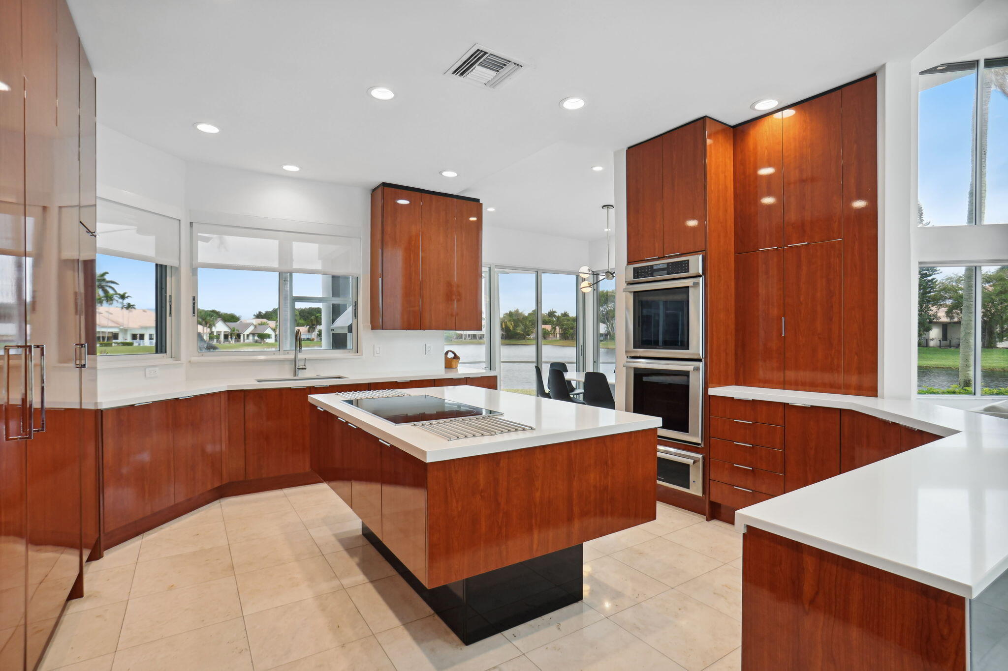 3205 St Charles Place Boca Raton, FL 33434 - Photo 33 of 84 Kitchen to family room