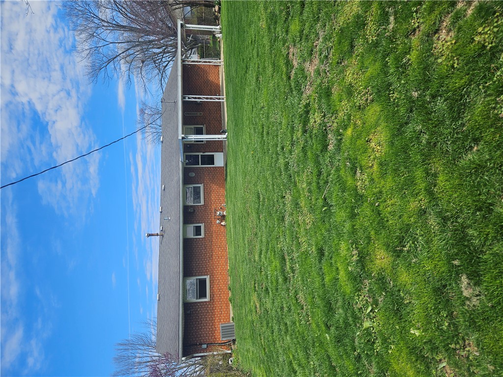 6510 Longford Road Dayton, OH 45424 - Photo 8 of 27 This classic brick residence offers a spacious yard, ideal for outdoor enjoyment and relaxation.