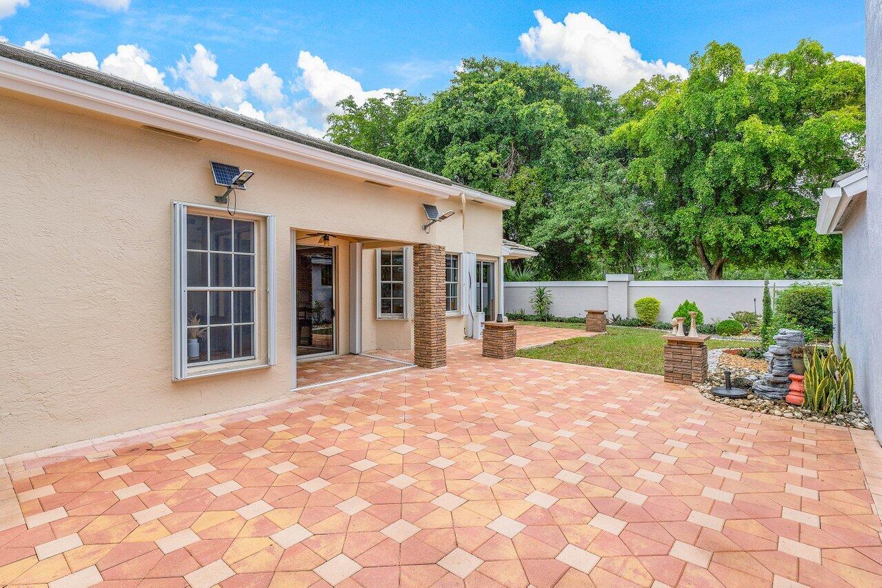 22840 Windsor Wood Court Boca Raton, FL 33433 - Photo 9 of 42 OVERSIZED Patio Area