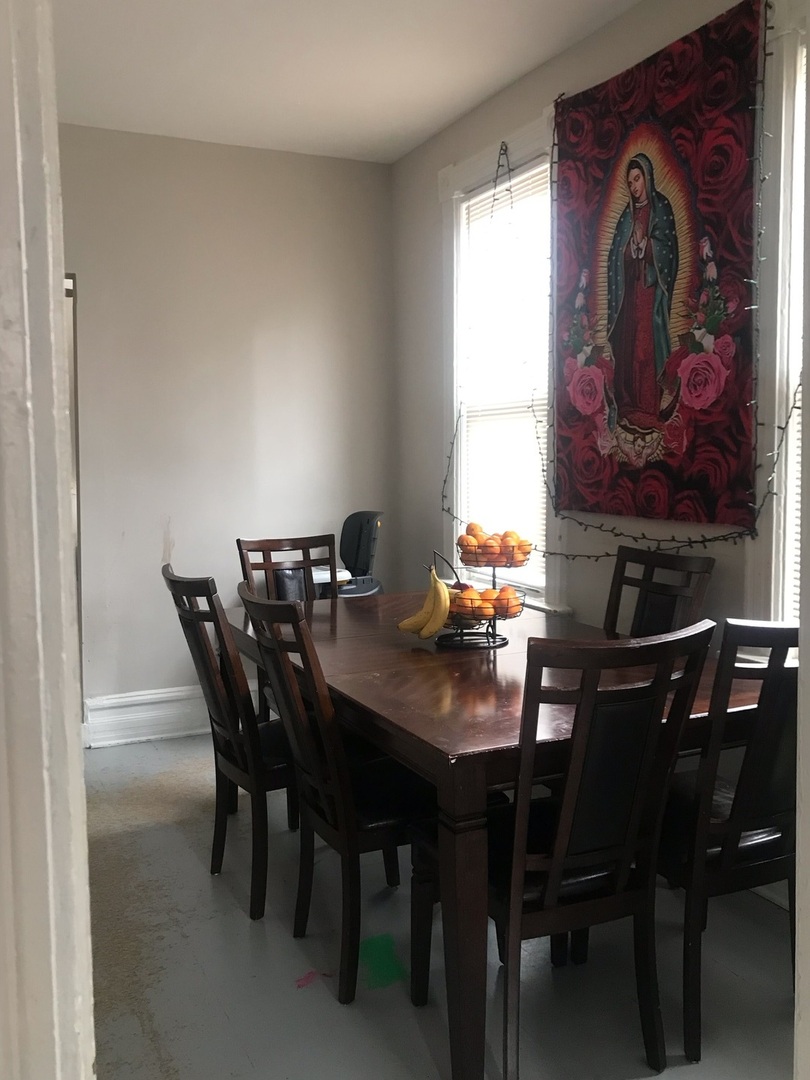 1852 West 17th Street Chicago, IL 60608 - Photo 13 of 19 a view of a dining room with furniture