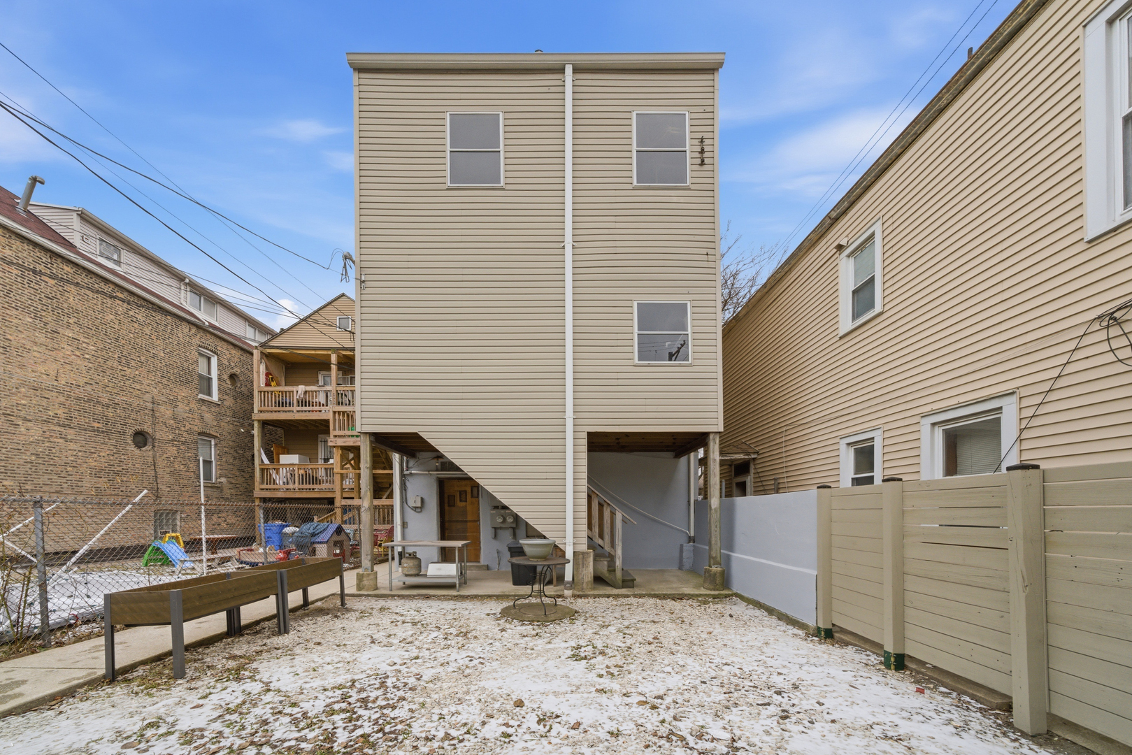 1852 West 17th Street Chicago, IL 60608 - Photo 4 of 19 a view of a house with a backyard