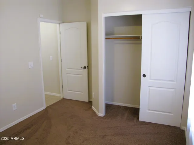 an empty room with closet