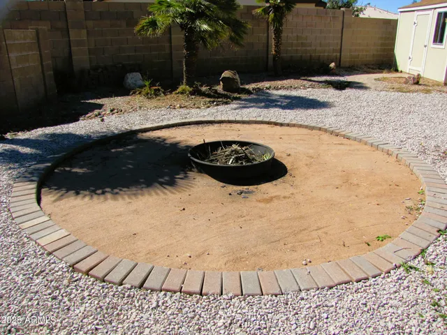 a view of swimming pool with patio