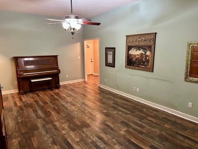 187 Collins Street Ripley, TN 38063 - Photo 16 of 39 a view of a livingroom with a chandelier