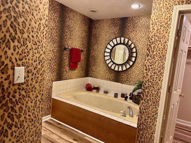 187 Collins Street Ripley, TN 38063 - Photo 26 of 39 a bathroom with a sink and a tub