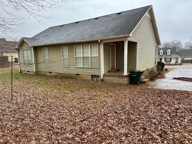 187 Collins Street Ripley, TN 38063 - Photo 3 of 39 a front view of a house with a yard