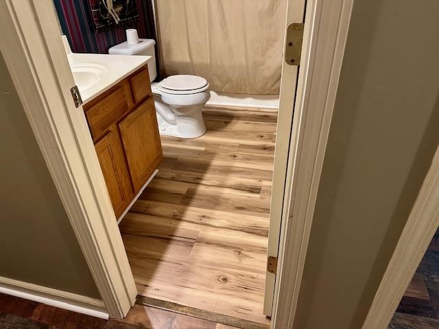 187 Collins Street Ripley, TN 38063 - Photo 33 of 39 a bathroom with a toilet and a sink