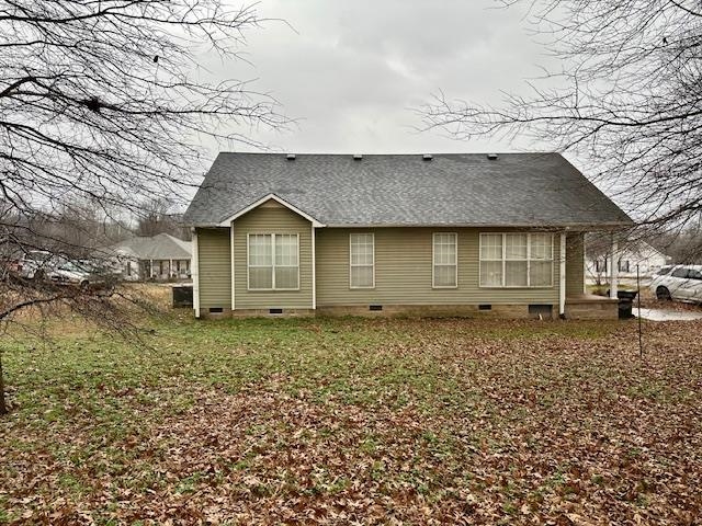 187 Collins Street Ripley, TN 38063 - Photo 4 of 39 a front view of a house with a garden