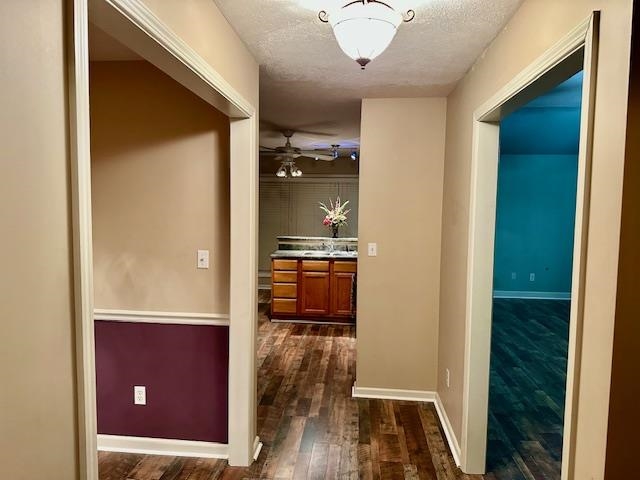 187 Collins Street Ripley, TN 38063 - Photo 5 of 39 a view of a hallway with wooden floor and a living room