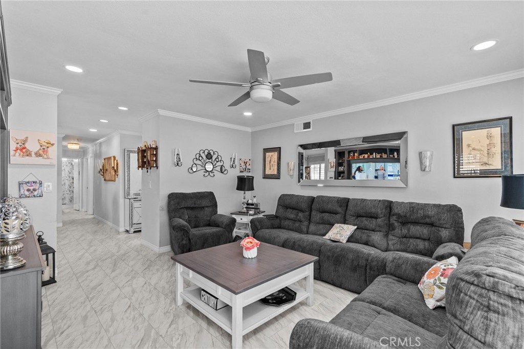 25536 Old Course Way Valencia, CA 91355 - Photo 16 of 37 a living room with furniture and a flat screen tv