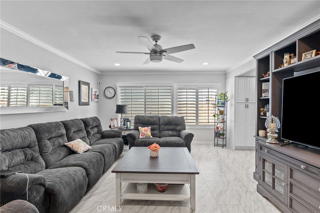 25536 Old Course Way Valencia, CA 91355 - Photo 18 of 37 a living room with furniture and a flat screen tv