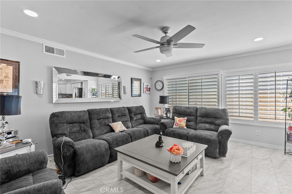25536 Old Course Way Valencia, CA 91355 - Photo 19 of 37 a living room with furniture and a window