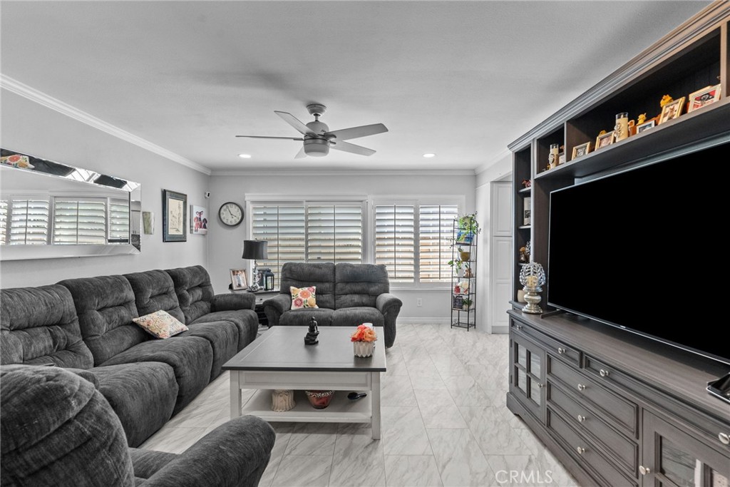 25536 Old Course Way Valencia, CA 91355 - Photo 20 of 37 a living room with furniture and a flat screen tv