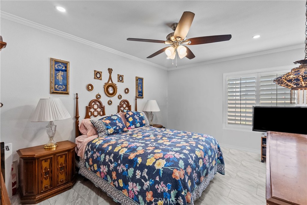 25536 Old Course Way Valencia, CA 91355 - Photo 22 of 37 a bedroom with a bed and a flat screen tv