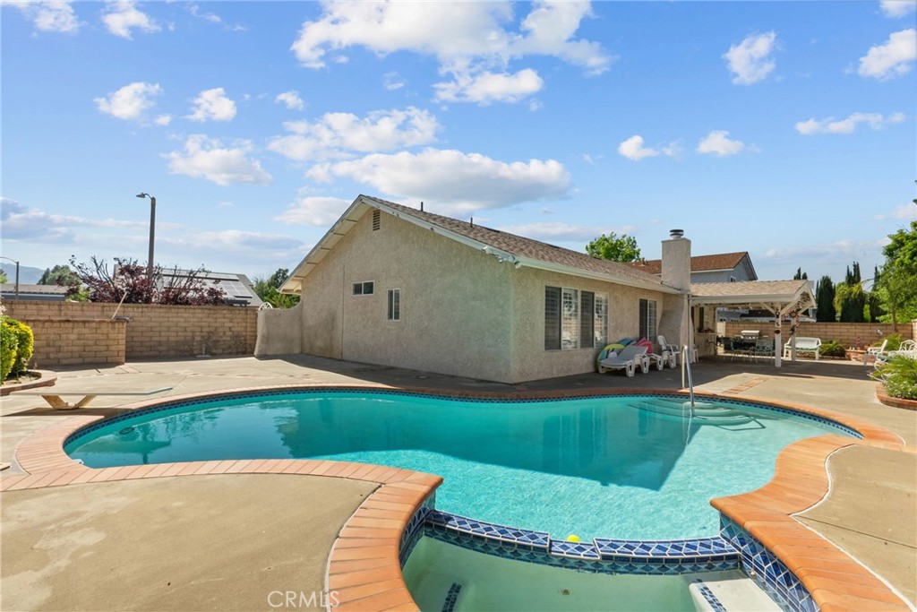 25536 Old Course Way Valencia, CA 91355 - Photo 35 of 37 a view of a house with swimming pool