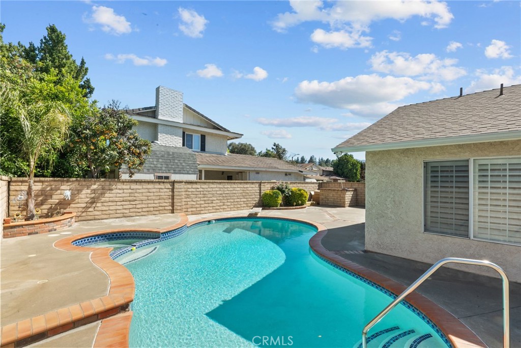 25536 Old Course Way Valencia, CA 91355 - Photo 36 of 37 a view of a house with pool and chairs