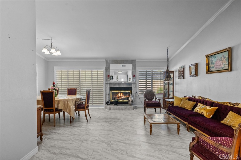 25536 Old Course Way Valencia, CA 91355 - Photo 6 of 37 a living room with furniture and a fireplace