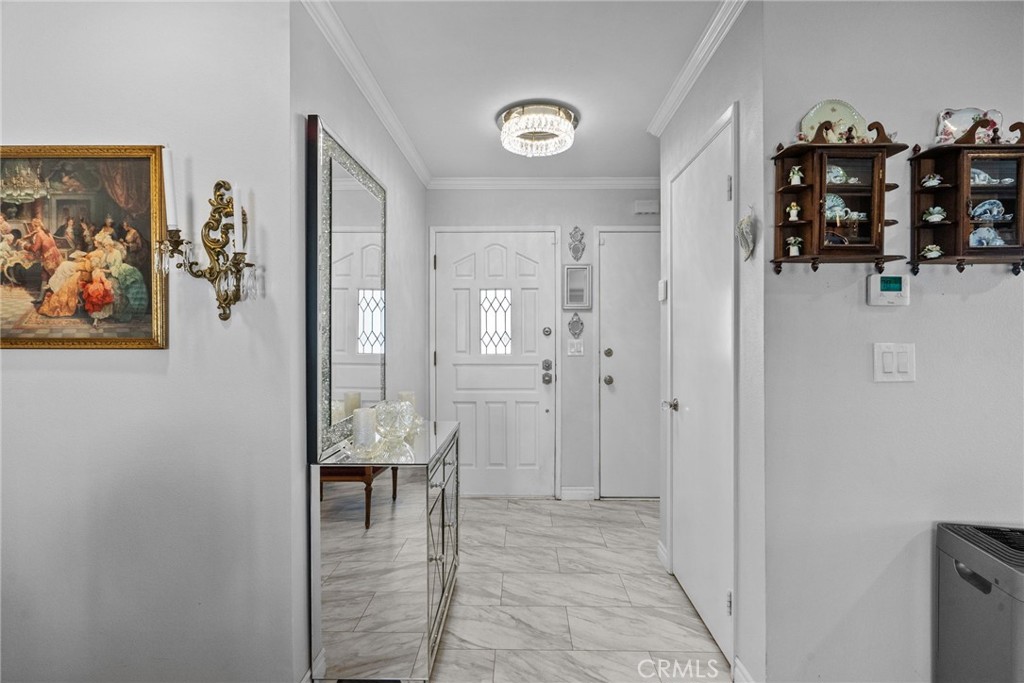 25536 Old Course Way Valencia, CA 91355 - Photo 7 of 37 a view of a livingroom with furniture and hallway view