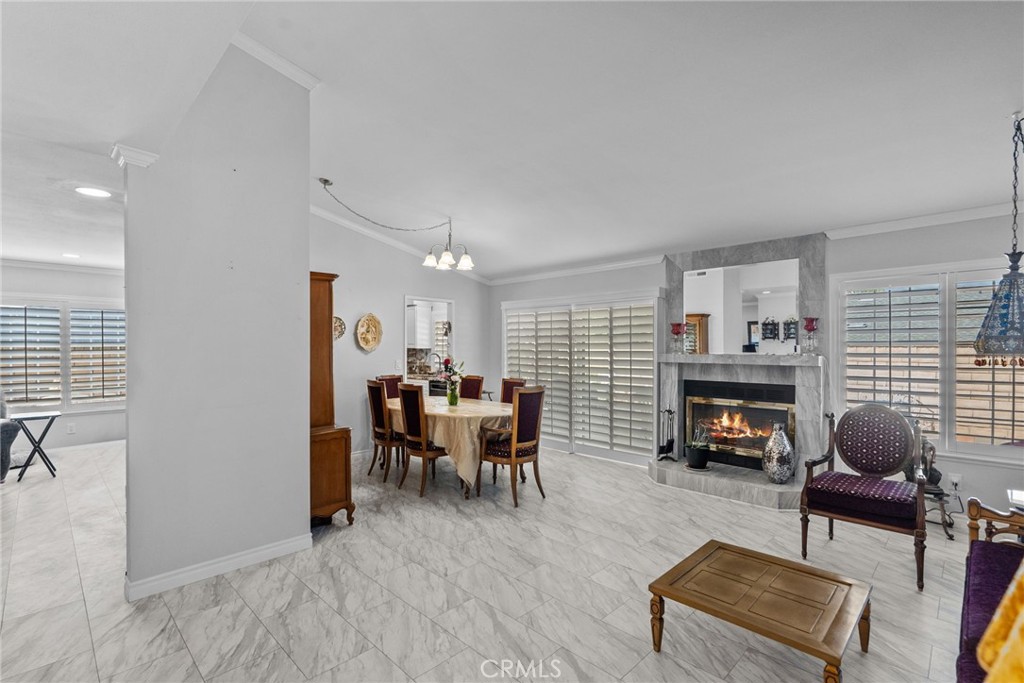 25536 Old Course Way Valencia, CA 91355 - Photo 8 of 37 a living room with furniture and a fireplace