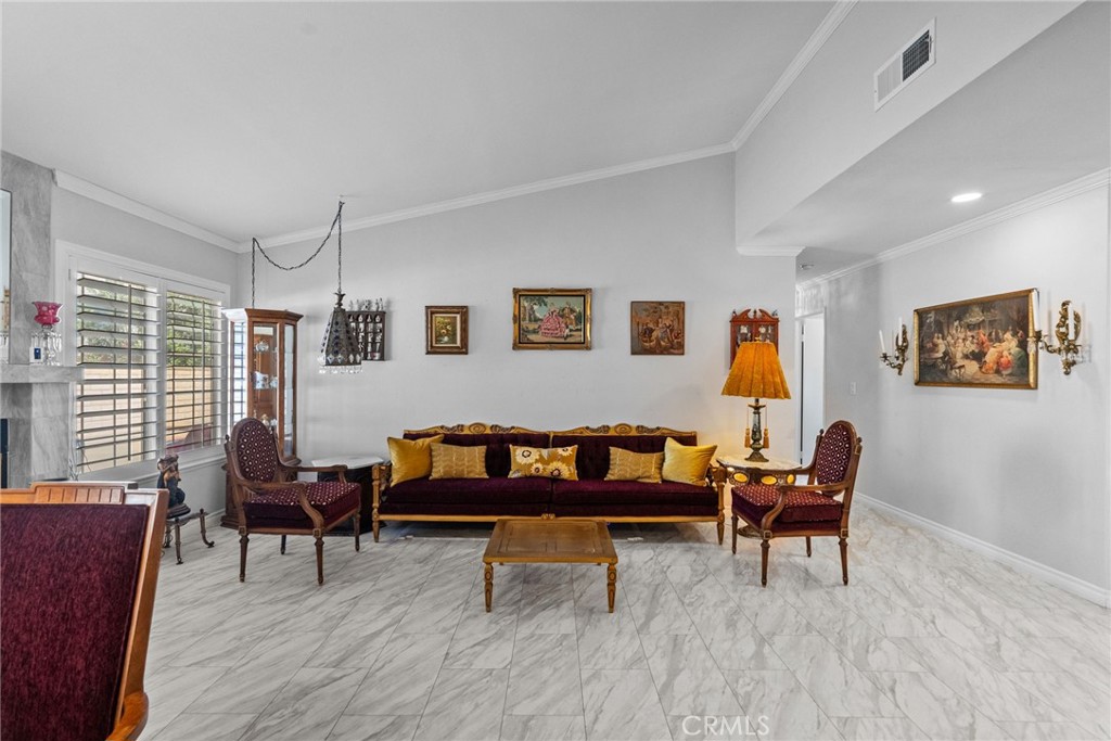 25536 Old Course Way Valencia, CA 91355 - Photo 10 of 37 a living room with furniture and a wooden floor