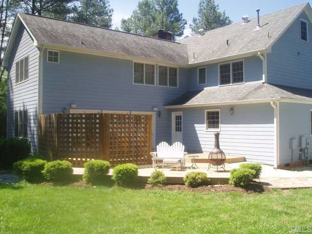 5104 Hallmark Road Durham, NC 27712 - Photo 5 of 12 a front view of house with yard and green space