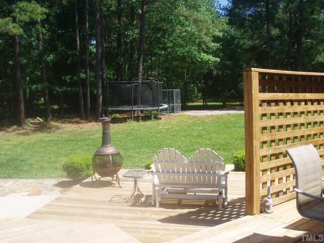 5104 Hallmark Road Durham, NC 27712 - Photo 6 of 12 a view of a patio with a table & chairs