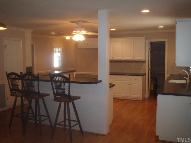 5104 Hallmark Road Durham, NC 27712 - Photo 8 of 12 a view of a dining room with furniture