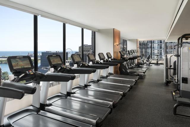 160 East Pearson Street, Unit 3104 Chicago, IL 60611 - Photo 11 of 12 a view of a room with gym equipment