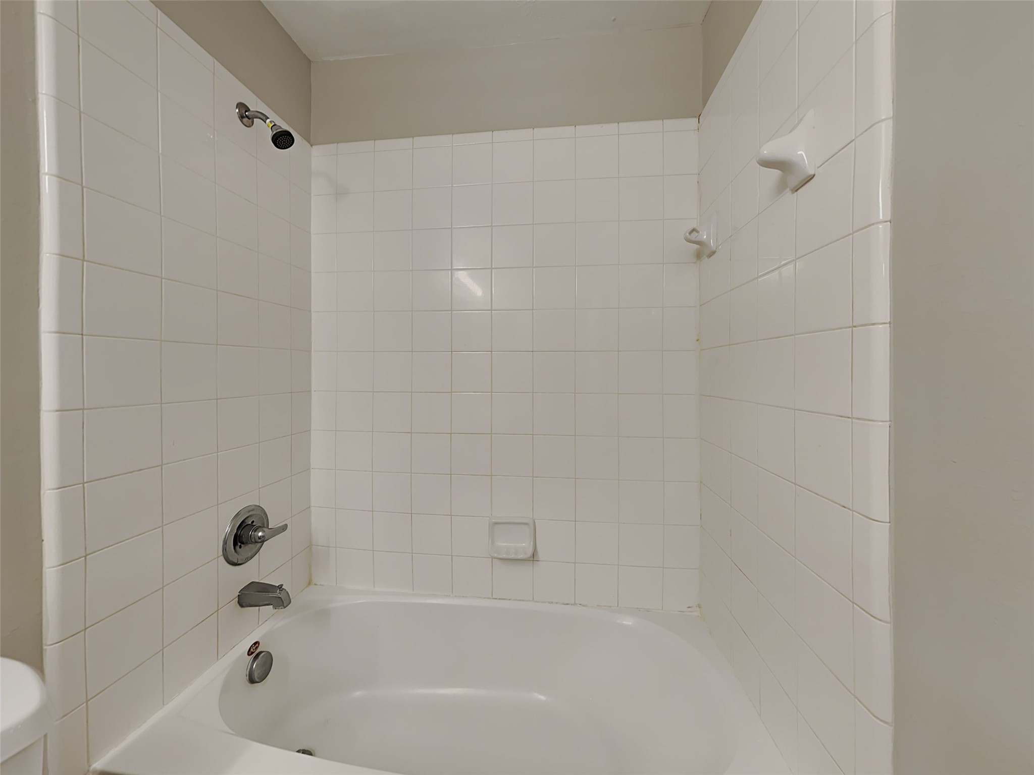 8119 Katie Mill Trail Spring, TX 77379 - Photo 2 of 18 a bathroom with a bathtub