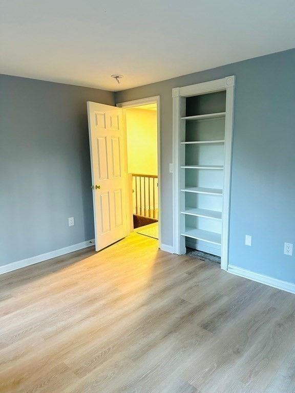 9 Averill Road, Unit B Middleton, MA 01949 - Photo 12 of 18 a view of an empty room with a window