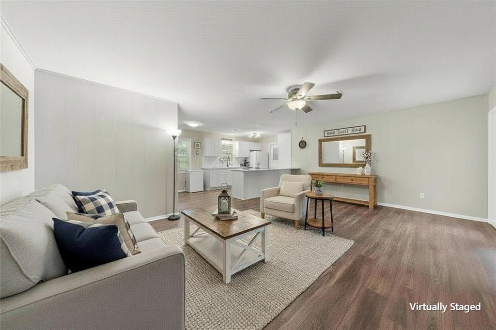 5907 Caldwell Street Waco, TX 76710 - Photo 6 of 22 a living room with furniture and a wooden floor