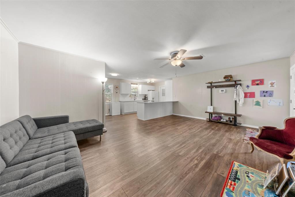 5907 Caldwell Street Waco, TX 76710 - Photo 7 of 22 a living room with furniture and kitchen view