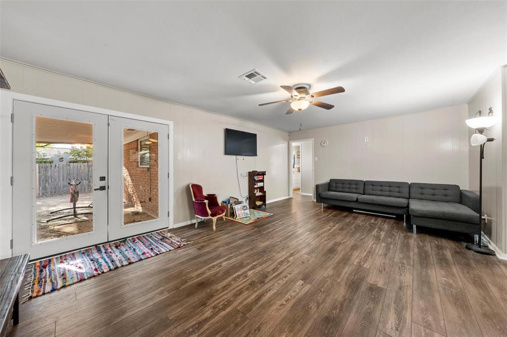 5907 Caldwell Street Waco, TX 76710 - Photo 8 of 22 a living room with furniture and a wooden floor