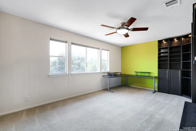 an empty room with windows